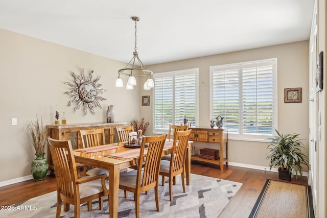33305 N 26th Ave, Phoenix, AZ 85085 - dining area featuring plenty of natural light and wood finished floors