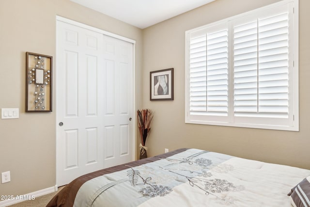 33305 N 26th Ave, Phoenix, AZ 85085 - carpeted bedroom featuring a closet and baseboards