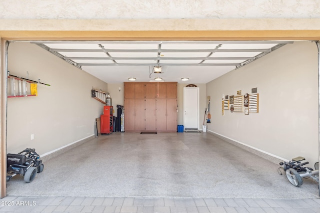 33305 N 26th Ave, Phoenix, AZ 85085 - garage with baseboards and a garage door opener