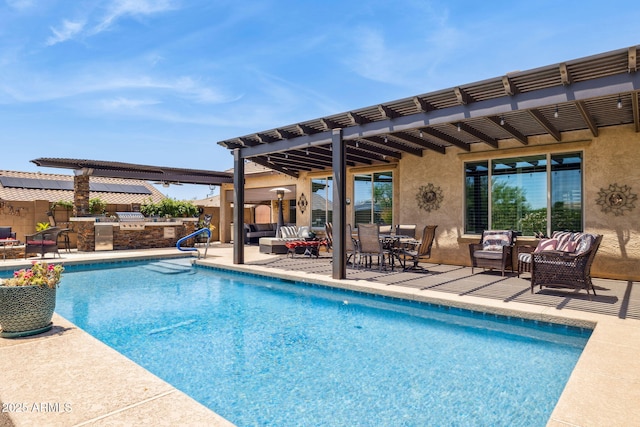 33305 N 26th Ave, Phoenix, AZ 85085 - view of swimming pool featuring an outdoor kitchen, outdoor lounge area, a patio area, and outdoor dining space