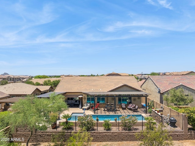 33305 N 26th Ave, Phoenix, AZ 85085 - rear view of house with outdoor lounge area, a fenced backyard, a patio, a tile roof, and stucco siding