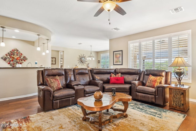 33305 N 26th Ave, Phoenix, AZ 85085 - living room featuring a ceiling fan and wood finished floors
