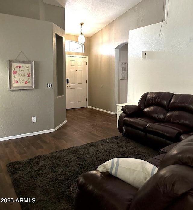 living room featuring dark hardwood / wood-style floors