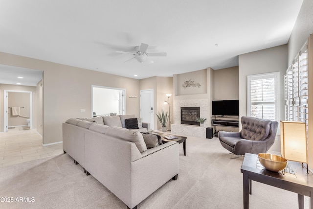 living room with light carpet and ceiling fan