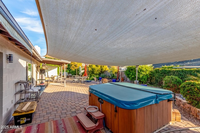 view of patio featuring a hot tub