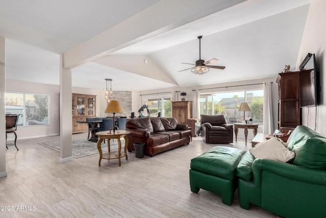 living room with lofted ceiling and ceiling fan