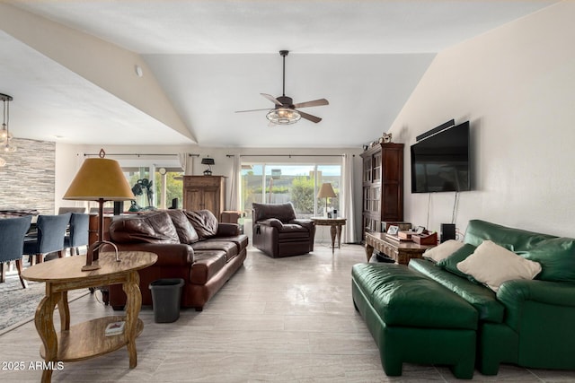 living room with vaulted ceiling and ceiling fan