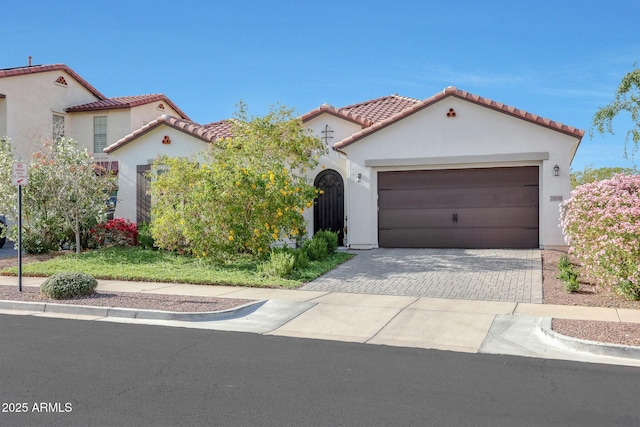 20510 W White Rock Rd, Buckeye, AZ 85396 - mediterranean / spanish-style house with stucco siding, driveway, a garage, and a tiled roof