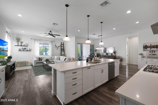 20510 W White Rock Rd, Buckeye, AZ 85396 - kitchen featuring a sink, appliances with stainless steel finishes, light countertops, white cabinets, and recessed lighting