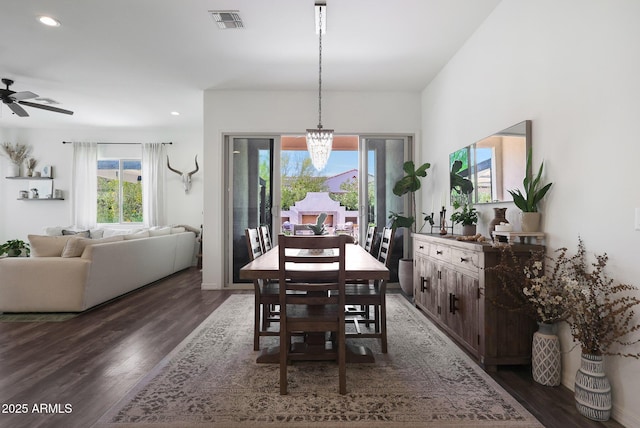 20510 W White Rock Rd, Buckeye, AZ 85396 - dining space featuring healthy amount of natural light, wood finished floors, recessed lighting, a chandelier, and a ceiling fan