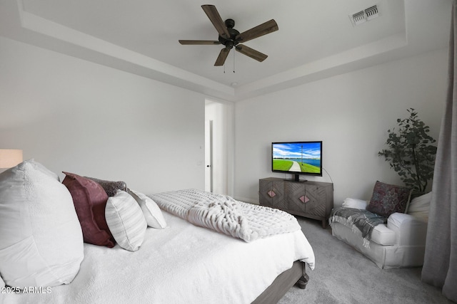 20510 W White Rock Rd, Buckeye, AZ 85396 - carpeted bedroom featuring a raised ceiling and ceiling fan