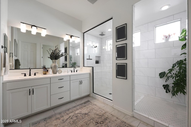 20510 W White Rock Rd, Buckeye, AZ 85396 - full bathroom featuring double vanity, walk in shower, and tile patterned floors