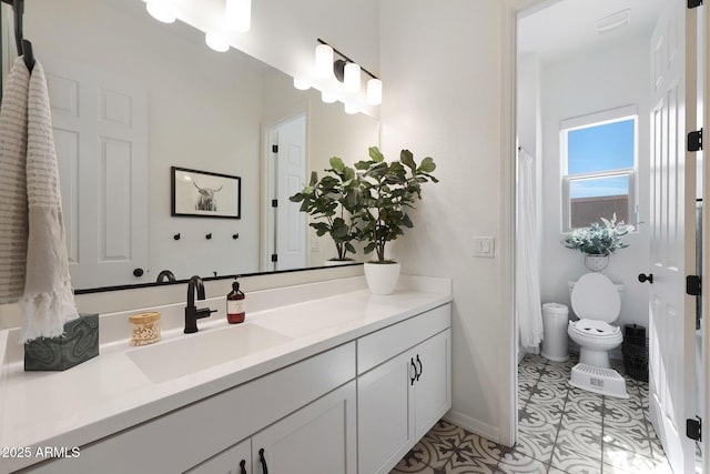 20510 W White Rock Rd, Buckeye, AZ 85396 - bathroom featuring vanity, baseboards, toilet, and tile patterned floors