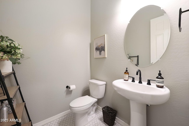 20510 W White Rock Rd, Buckeye, AZ 85396 - bathroom featuring toilet, tile patterned floors, and baseboards