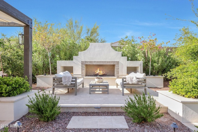 20510 W White Rock Rd, Buckeye, AZ 85396 - view of patio / terrace featuring an outdoor living space with a fireplace