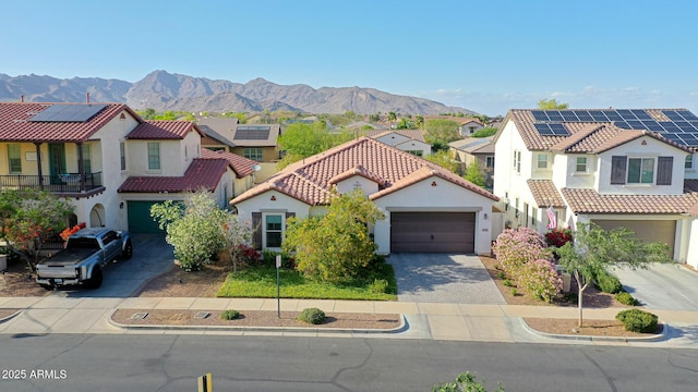 20510 W White Rock Rd, Buckeye, AZ 85396 - mediterranean / spanish home featuring a residential view, driveway, stucco siding, and a tiled roof