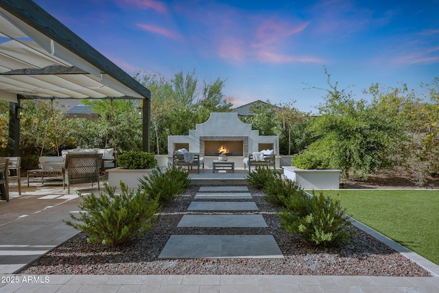 20510 W White Rock Rd, Buckeye, AZ 85396 - view of patio with an outdoor living space with a fireplace