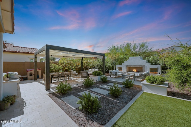 20510 W White Rock Rd, Buckeye, AZ 85396 - view of patio featuring a warm lit fireplace