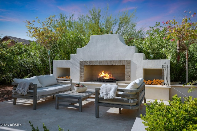 20510 W White Rock Rd, Buckeye, AZ 85396 - view of patio / terrace with an outdoor living space with a fireplace