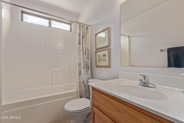 bathroom featuring toilet, vanity, and shower / bath combo