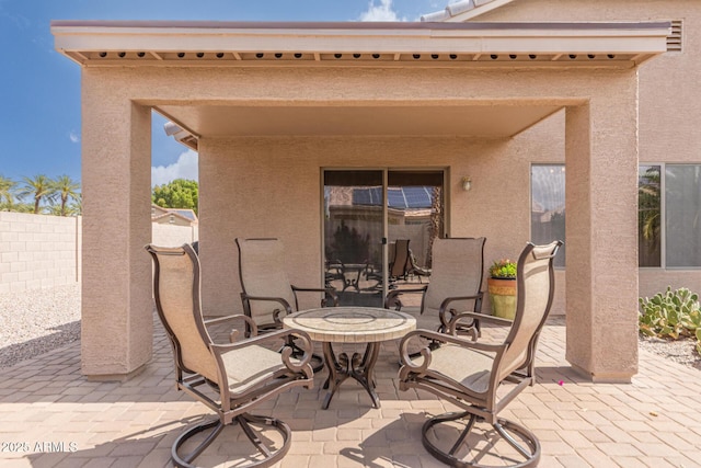 view of patio / terrace with fence