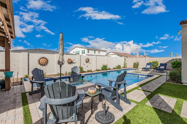 view of pool with a fenced in pool, a fire pit, a fenced backyard, and a patio area