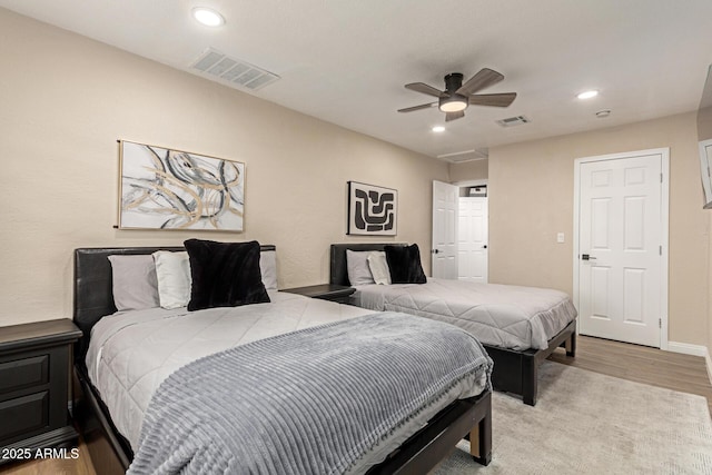 bedroom featuring visible vents, recessed lighting, a ceiling fan, and light wood finished floors