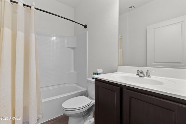 full bathroom featuring shower / tub combo with curtain, visible vents, toilet, vanity, and wood finished floors