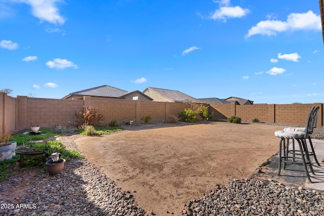 view of yard featuring a fenced backyard