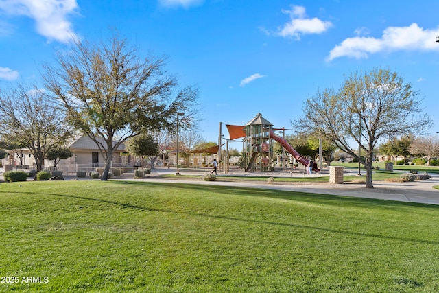 community play area featuring a lawn