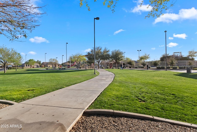 view of community featuring a lawn