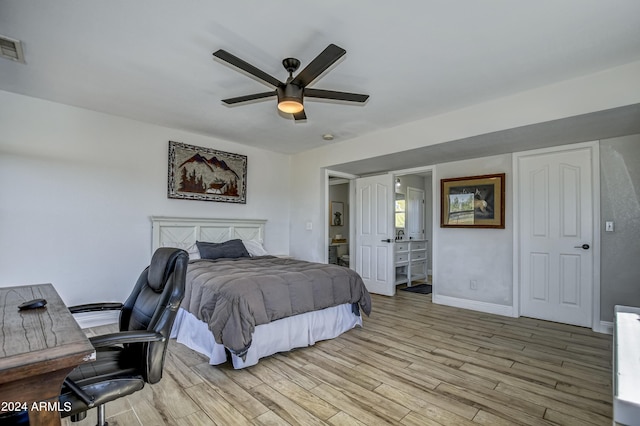 bedroom featuring light hardwood / wood-style flooring and ceiling fan