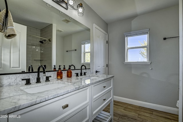 bathroom featuring hardwood / wood-style floors and vanity