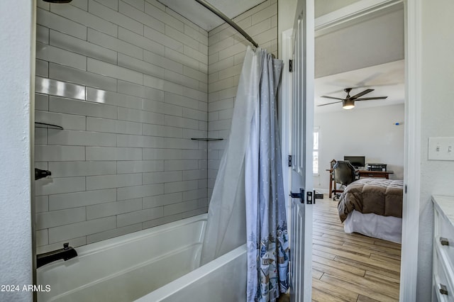 bathroom with wood-type flooring, ceiling fan, and shower / bath combo with shower curtain