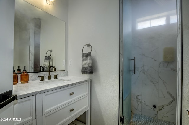 bathroom featuring vanity and walk in shower