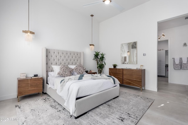 bedroom featuring concrete flooring and ceiling fan