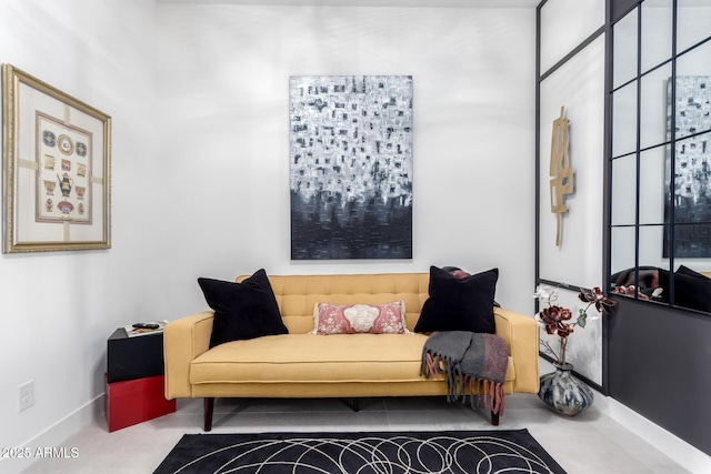 sitting room with light colored carpet