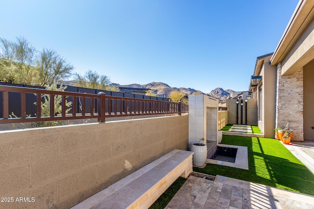 view of patio featuring a mountain view