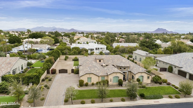 bird's eye view with a residential view and a mountain view