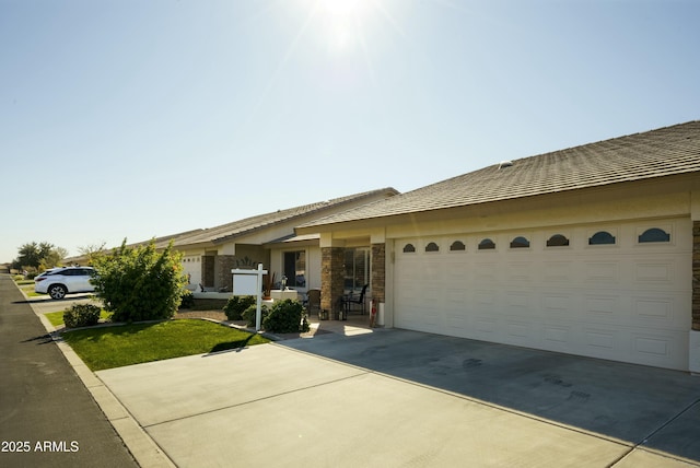 ranch-style home with a garage