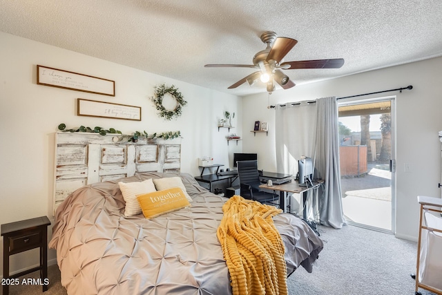 carpeted bedroom featuring a textured ceiling, a ceiling fan, and access to outside