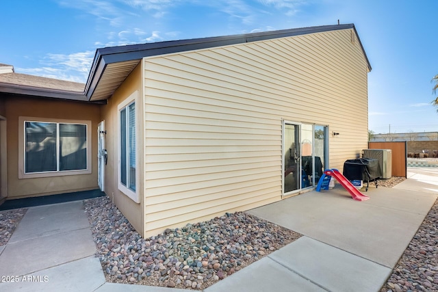 view of home's exterior featuring a patio