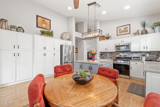 4462 E Dale Ln, Cave Creek, AZ 85331 - dining area with ceiling fan and recessed lighting