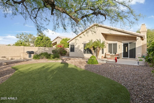 4462 E Dale Ln, Cave Creek, AZ 85331 - back of house with stucco siding, a patio area, and a chimney
