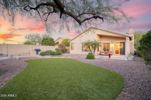 4462 E Dale Ln, Cave Creek, AZ 85331 - yard at dusk featuring a patio