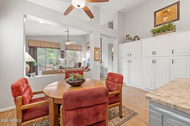 4462 E Dale Ln, Cave Creek, AZ 85331 - dining area featuring ceiling fan, light wood finished floors, and vaulted ceiling