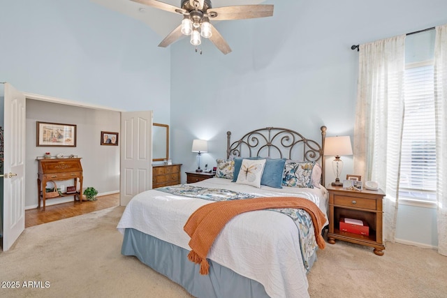 4462 E Dale Ln, Cave Creek, AZ 85331 - carpeted bedroom featuring a towering ceiling, baseboards, and a ceiling fan