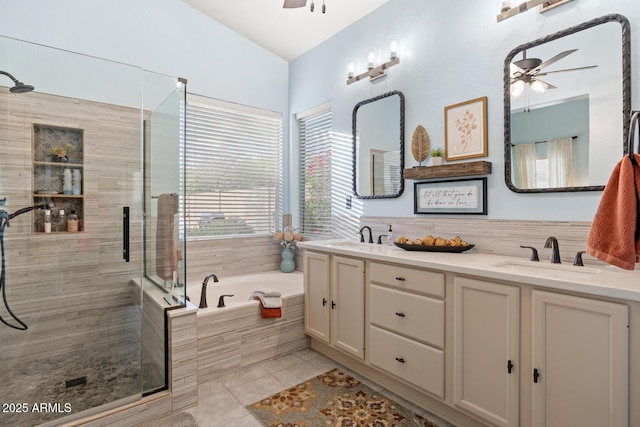 4462 E Dale Ln, Cave Creek, AZ 85331 - bathroom featuring a ceiling fan, a stall shower, a garden tub, and double vanity