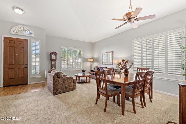 4462 E Dale Ln, Cave Creek, AZ 85331 - dining area featuring light colored carpet, baseboards, vaulted ceiling, and ceiling fan