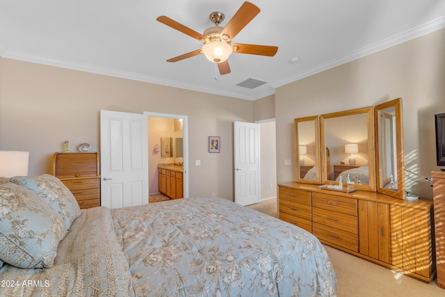 bedroom featuring ceiling fan, ornamental molding, light carpet, and connected bathroom